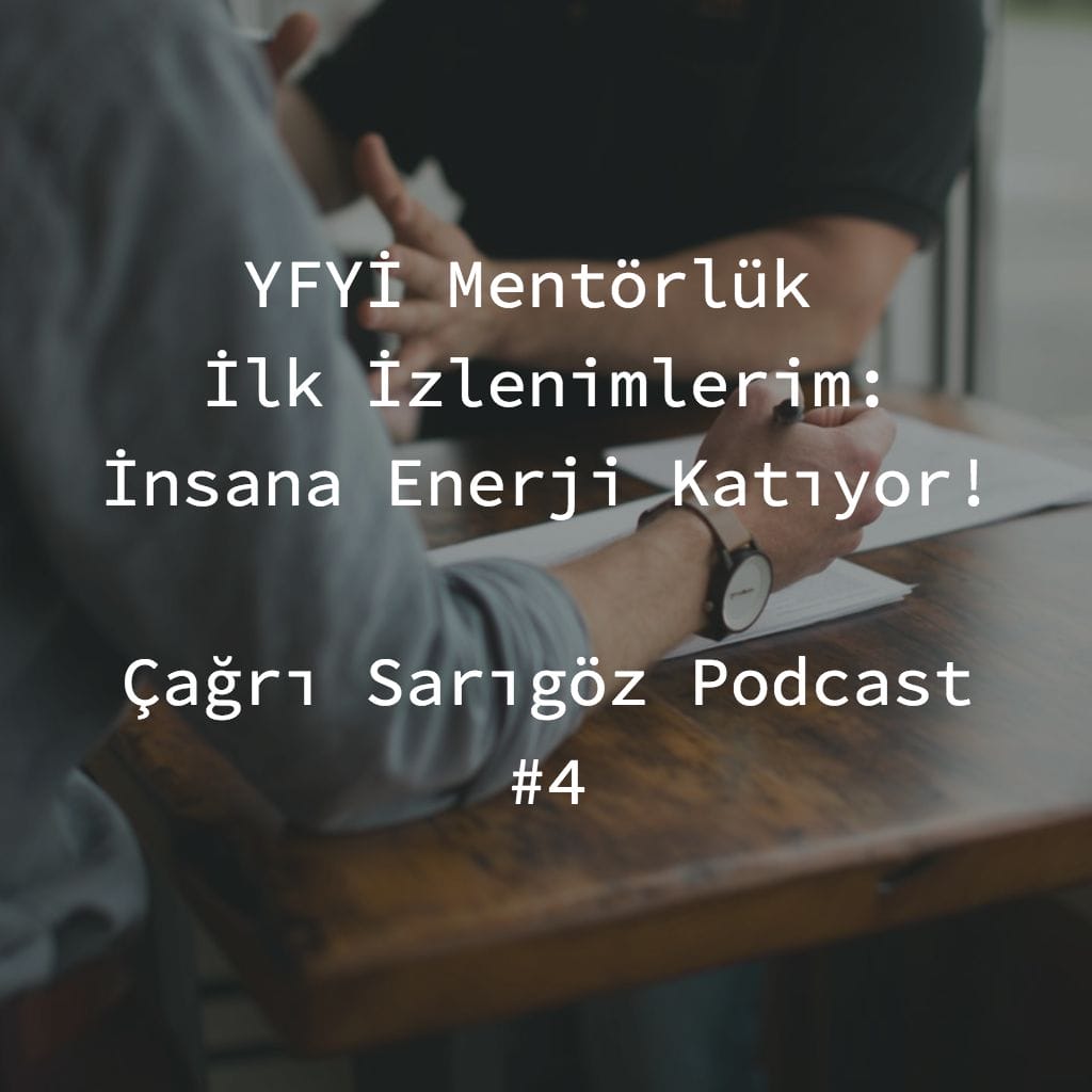 A man and woman sitting at a table with the words yf mentorluk.