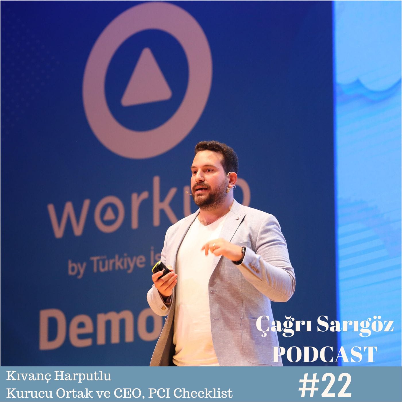 A man is standing in front of a podium with the words worko by igor sngi.